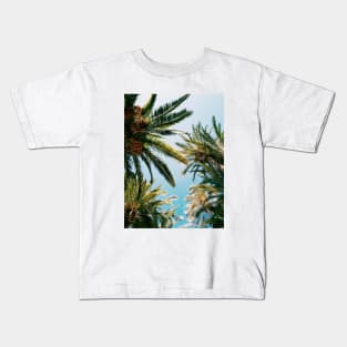 Palms in the sky Kids T-Shirt